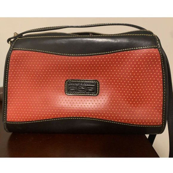 Dooney & Bourke red crossbody black leather yellow perforated dots.